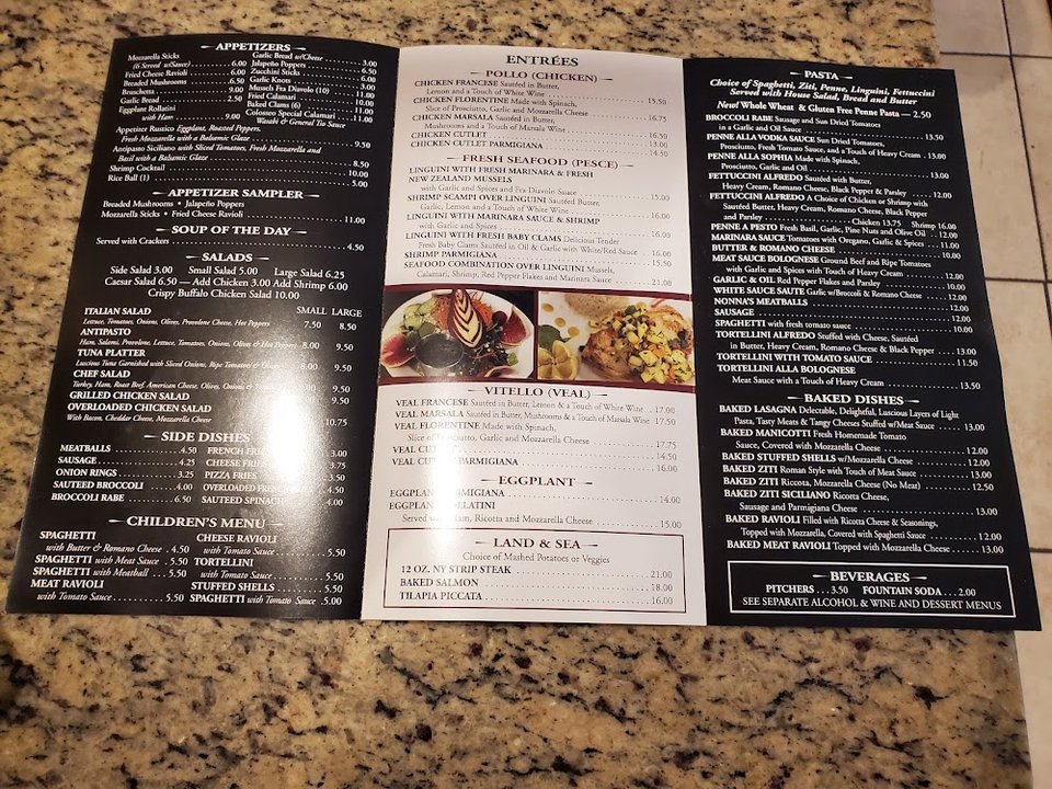Printed menu showing Italian sandwiches and dinners.